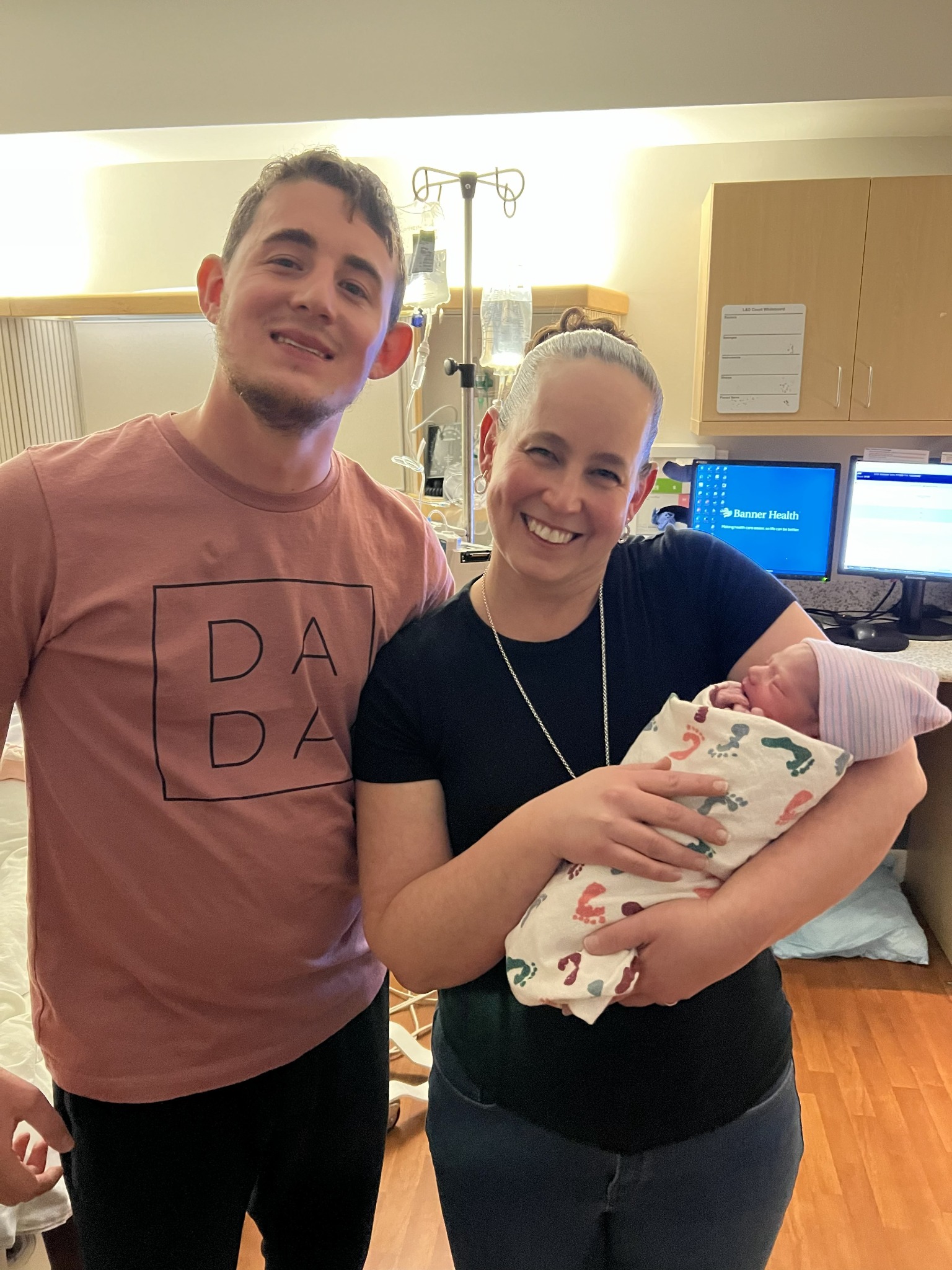 Irish's family with a newborn baby in the hospital