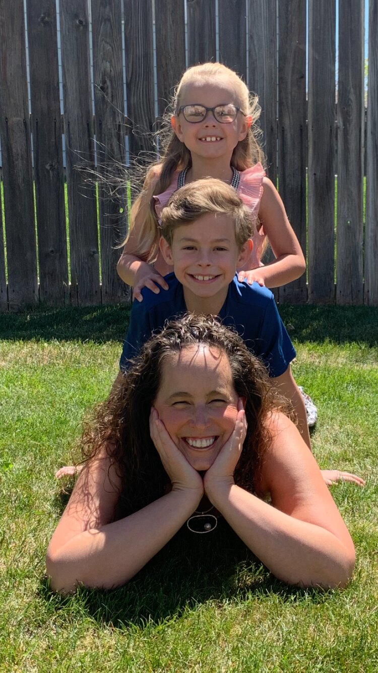 Irish smiling with Ayden and Emmy Jo outdoors