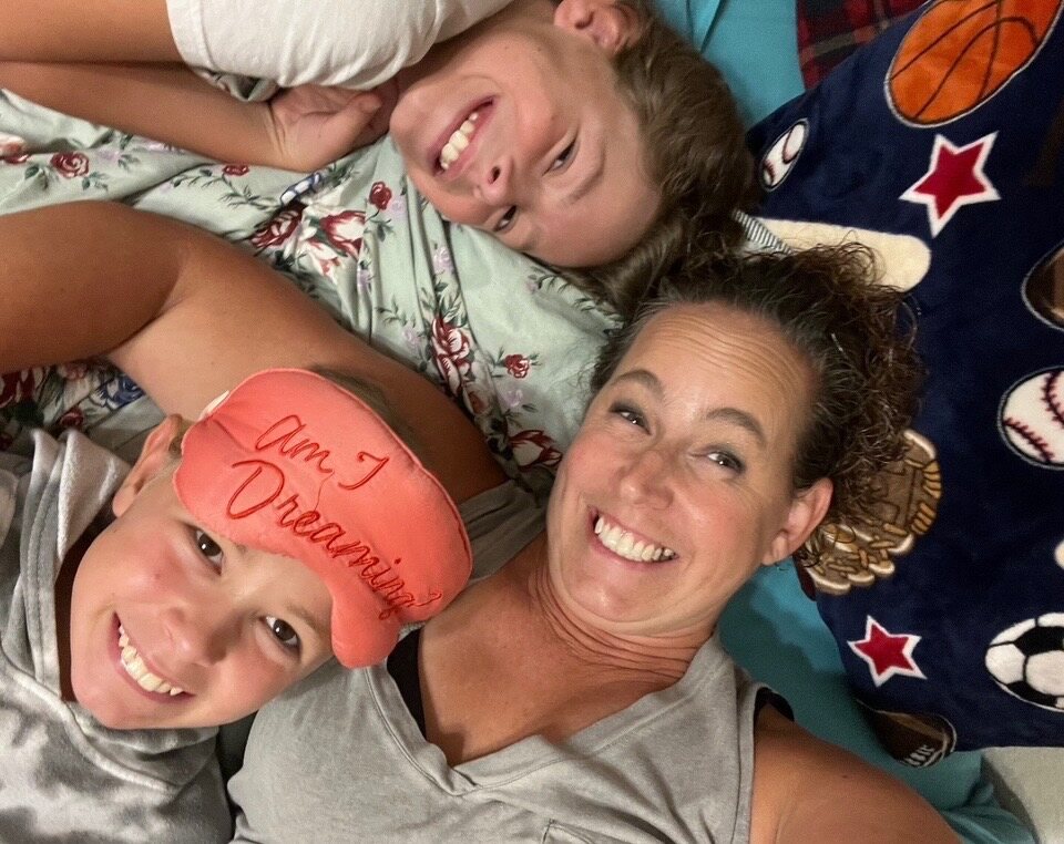 Irish smiling with Ayden and Emmy Jo during family time
